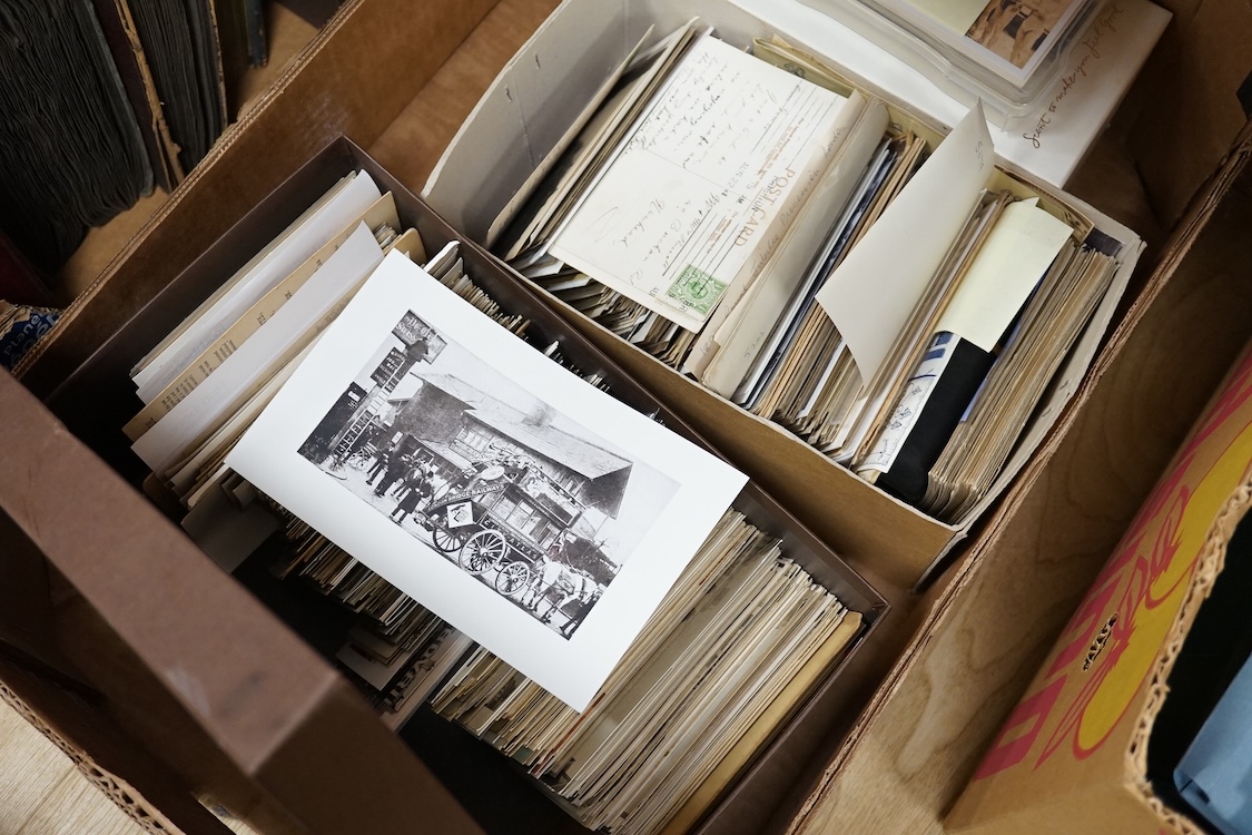 A collection of early 20th century postcards, photographs, etc. Including three albums of novelty postcards, scenes of London, etc. First World War postcards, etc. and an Edwardian photograph album, together with four bo